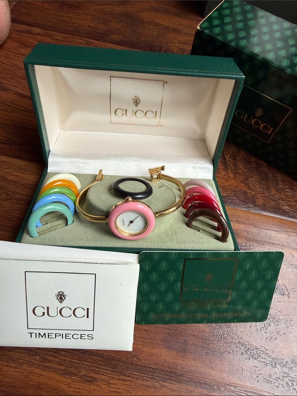 Gucci Gold Bangle Watch with Interchangeable Color Bezels - Pink Dial